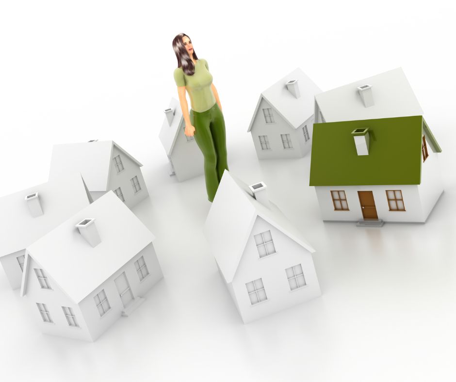 female doll surrounded by toys homes, 1 with a green roof